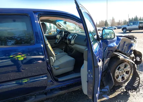 2015 Toyota Tacoma Base V6 из США, поврежденный, VIN 3TMMU4FN5FM079297